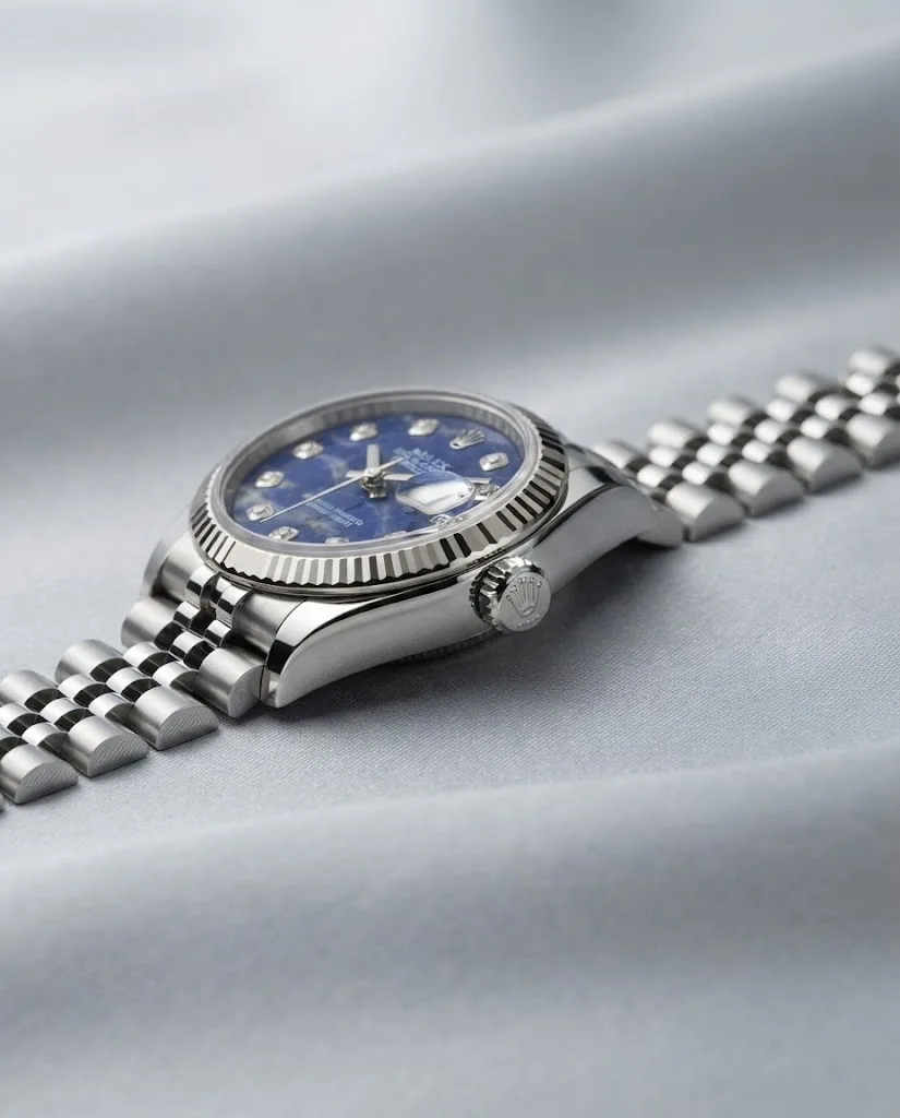 Illustrative render — reading the listing of the Rolex Lady-Datejust 26 79174 (steel, white gold fluted bezel, sodalite diamond dial)