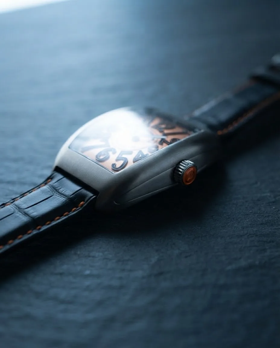 Illustrative render — reading the listing of the Franck Muller Vanguard Crazy Hours V 45 CH BR (orange) (brushed steel, orange numerals, black alligator strap with orange stitching)