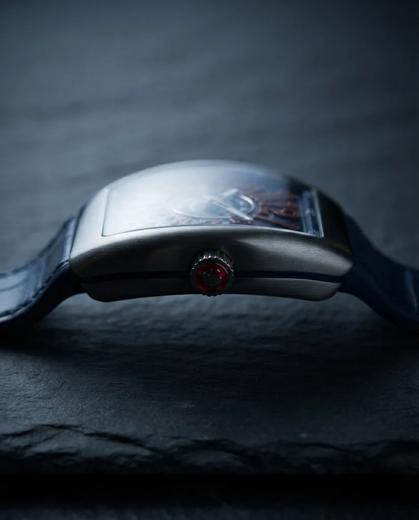 Illustrative render — reading the listing of the Franck Muller Vanguard Crazy Hours V 45 CH TT (blue dial, white numerals outlined in red, blue alligator-grain leather-insert strap)