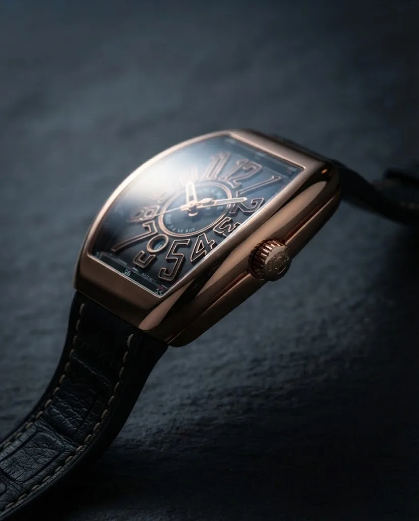 Illustrative render — reading the listing of the Franck Muller Vanguard V 45 SC DT 5N NR (18k rose gold, black guilloche dial, black leather-top rubber strap)