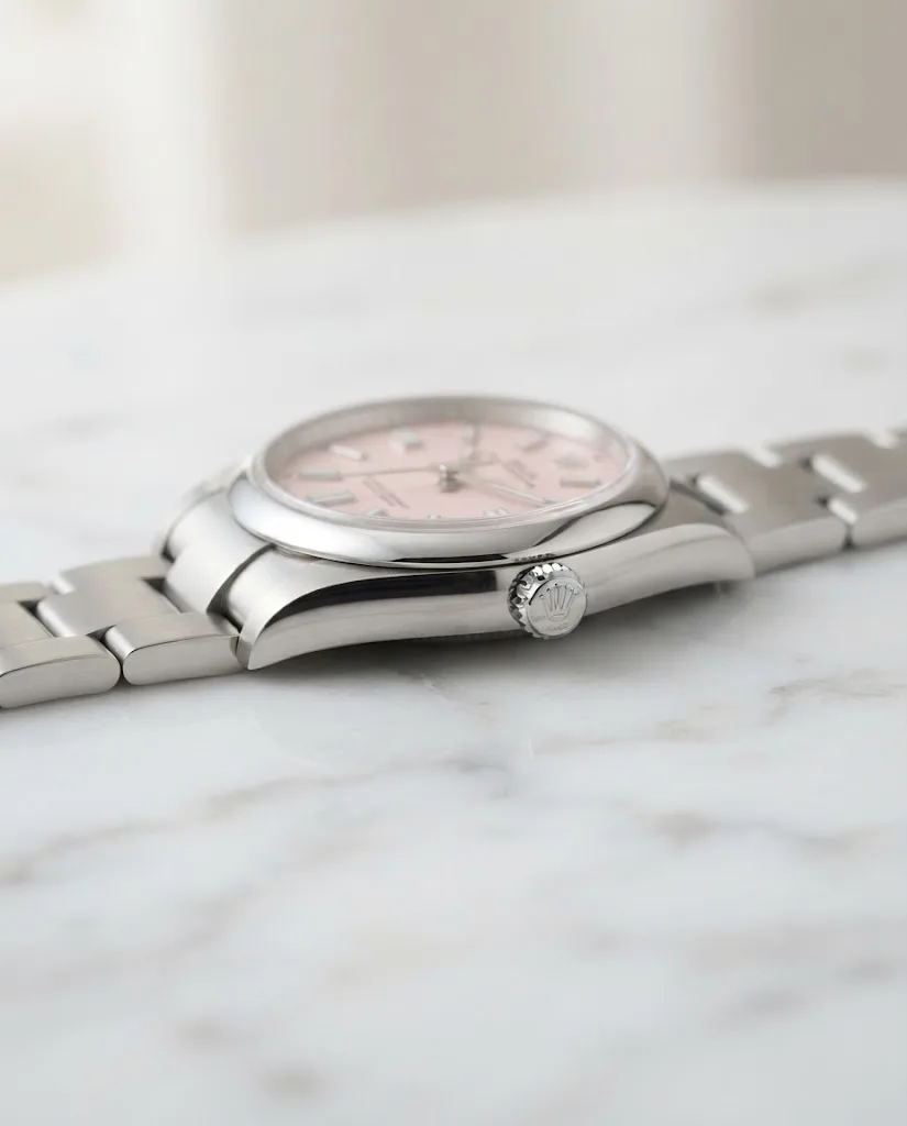 Illustrative render — reading the listing of the Rolex Oyster Perpetual 36 126000 candy pink dial