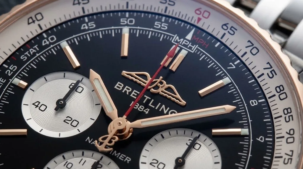 Illustrative render — where the gold is of the Breitling Navitimer B01 Chronograph 43 UB0121211F1A1 (steel and 18k red gold, black dial, steel bracelet)