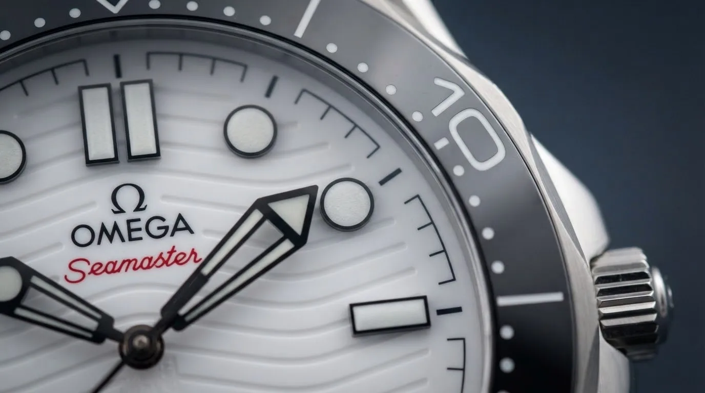 Illustrative render — the white dial, and the red of the Omega Seamaster Diver 300M Co-Axial Master Chronometer 42mm 210.30.42.20.04.001 (steel, white ceramic dial, steel bracelet)