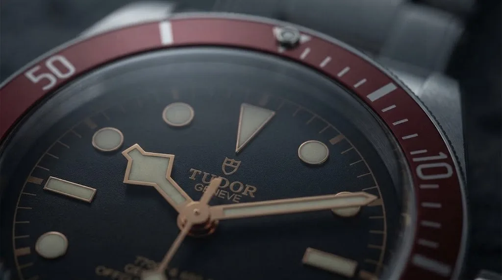 Illustrative render — what changed in 2023 of the Tudor Black Bay 41mm M7941A1A0RU-0001 (steel, burgundy bezel, black dial, steel bracelet, METAS Master Chronometer)