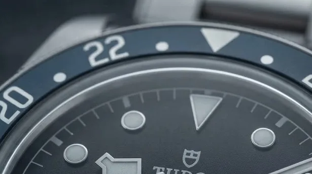 Illustrative render — a flyer’s gmt, not a caller’s of the Tudor Black Bay GMT 41mm M79830RB-0001 (steel, burgundy and blue bezel, black dial, riveted steel bracelet)