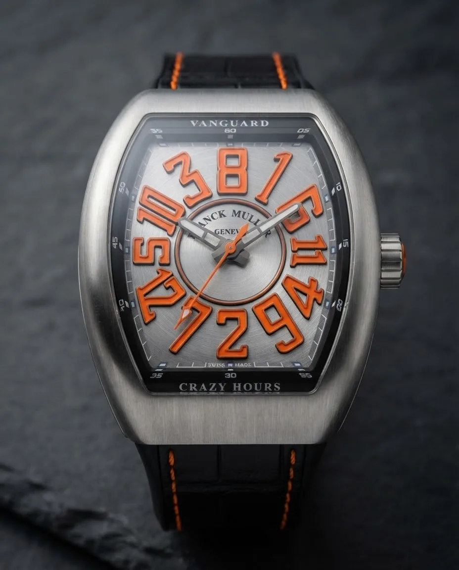 Illustrative render — hero view of the Franck Muller Vanguard Crazy Hours V 45 CH BR (orange) (brushed steel, orange numerals, black alligator strap with orange stitching)