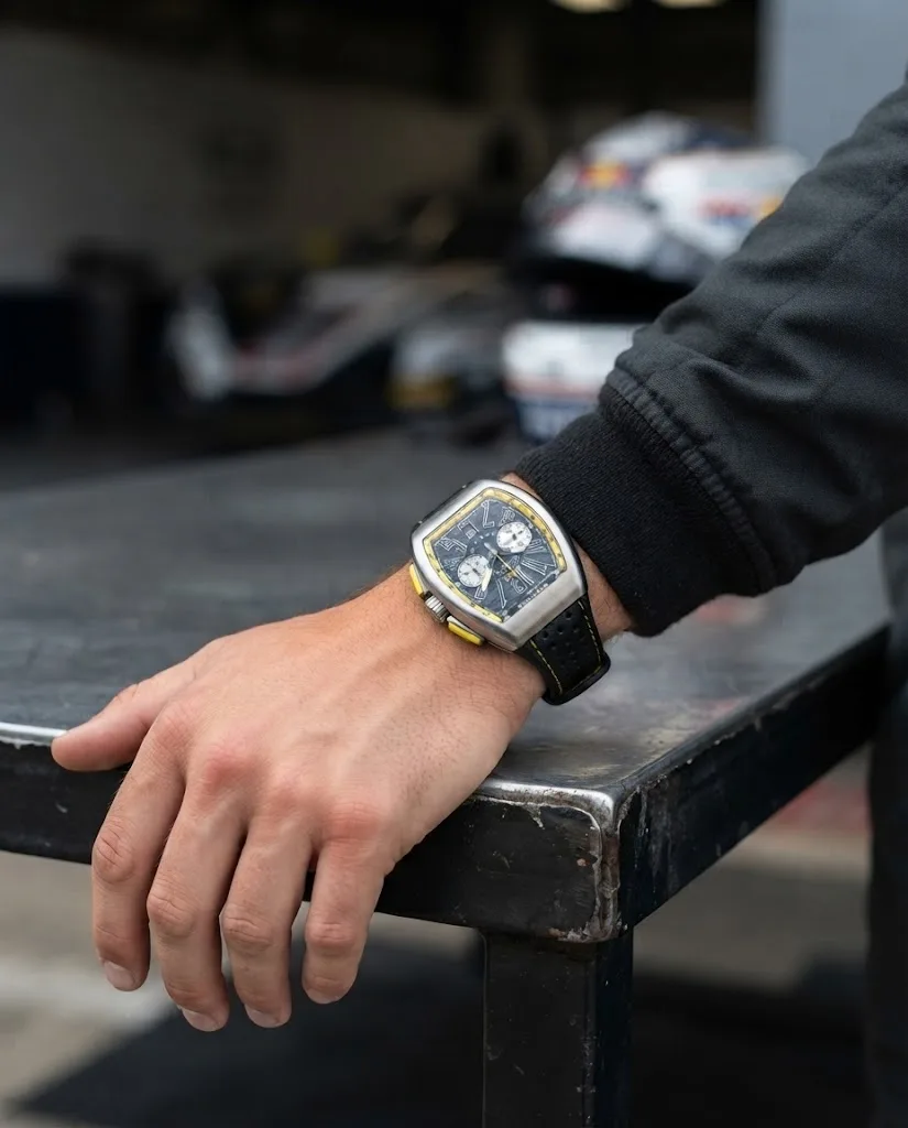 Illustrative render — buying it on amazon of the Franck Muller Vanguard Racing V 45 CC DT chronograph (steel, black dial, yellow flange, black leather-insert rubber strap)