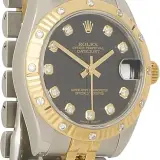 Datejust 31 ref. 178313 (steel and 18k yellow gold, fluted bezel set with diamonds, black diamond dial, Jubilee bracelet, box, pre-owned)