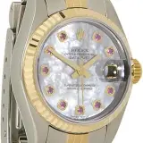 Lady-Datejust 26 ref. 79173 (steel and 18k yellow gold, mother-of-pearl dial with ruby markers, fluted bezel, Jubilee bracelet, box and papers, pre-owned)