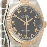 Datejust 36 ref. 116231 (steel and 18k Everose gold, black Roman dial, fluted bezel, Jubilee bracelet, box, pre-owned)