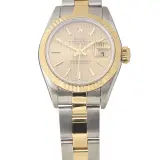 Lady-Datejust 26 ref. 69173 (steel and 18k yellow gold, champagne tapestry dial, fluted bezel, Oyster bracelet, pre-owned)