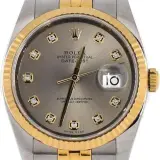 Datejust 36 (steel and 18k yellow gold, silver dial with diamond markers, fluted bezel, Jubilee bracelet, dated warranty card, pre-owned)